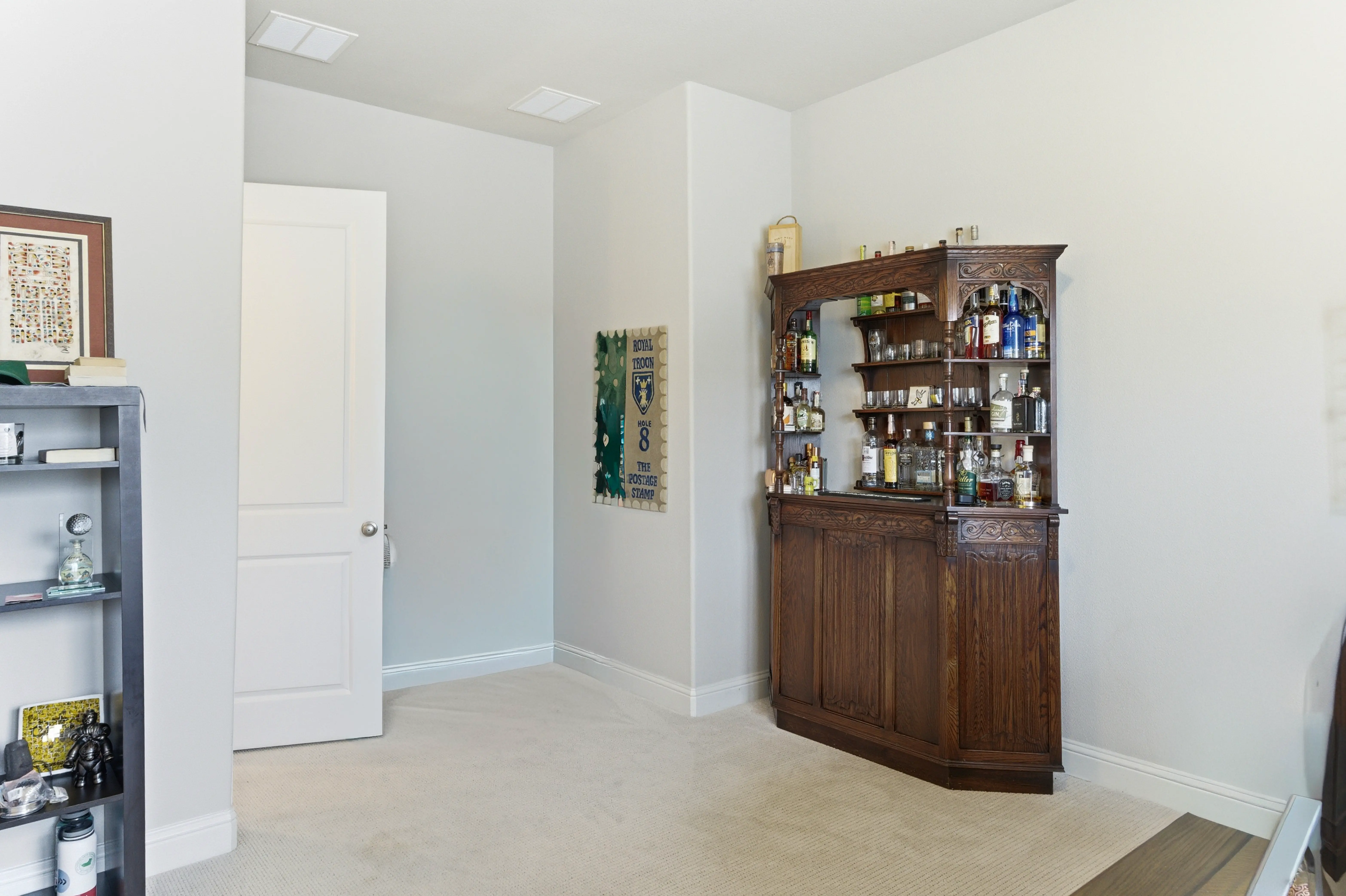 Second-floor game room with bar and entertainment area
