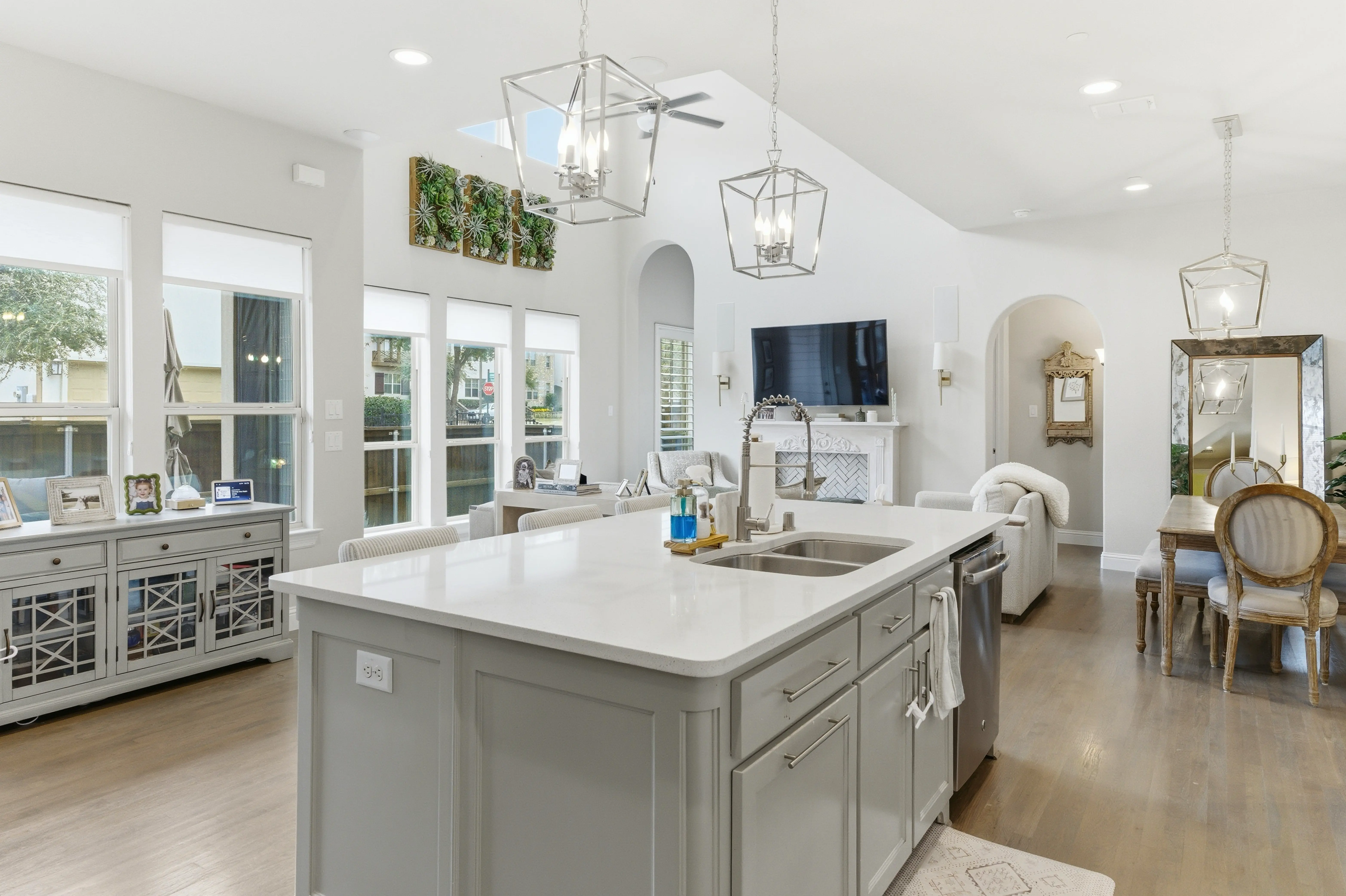 Kitchen from opposite angle showing island and open concept