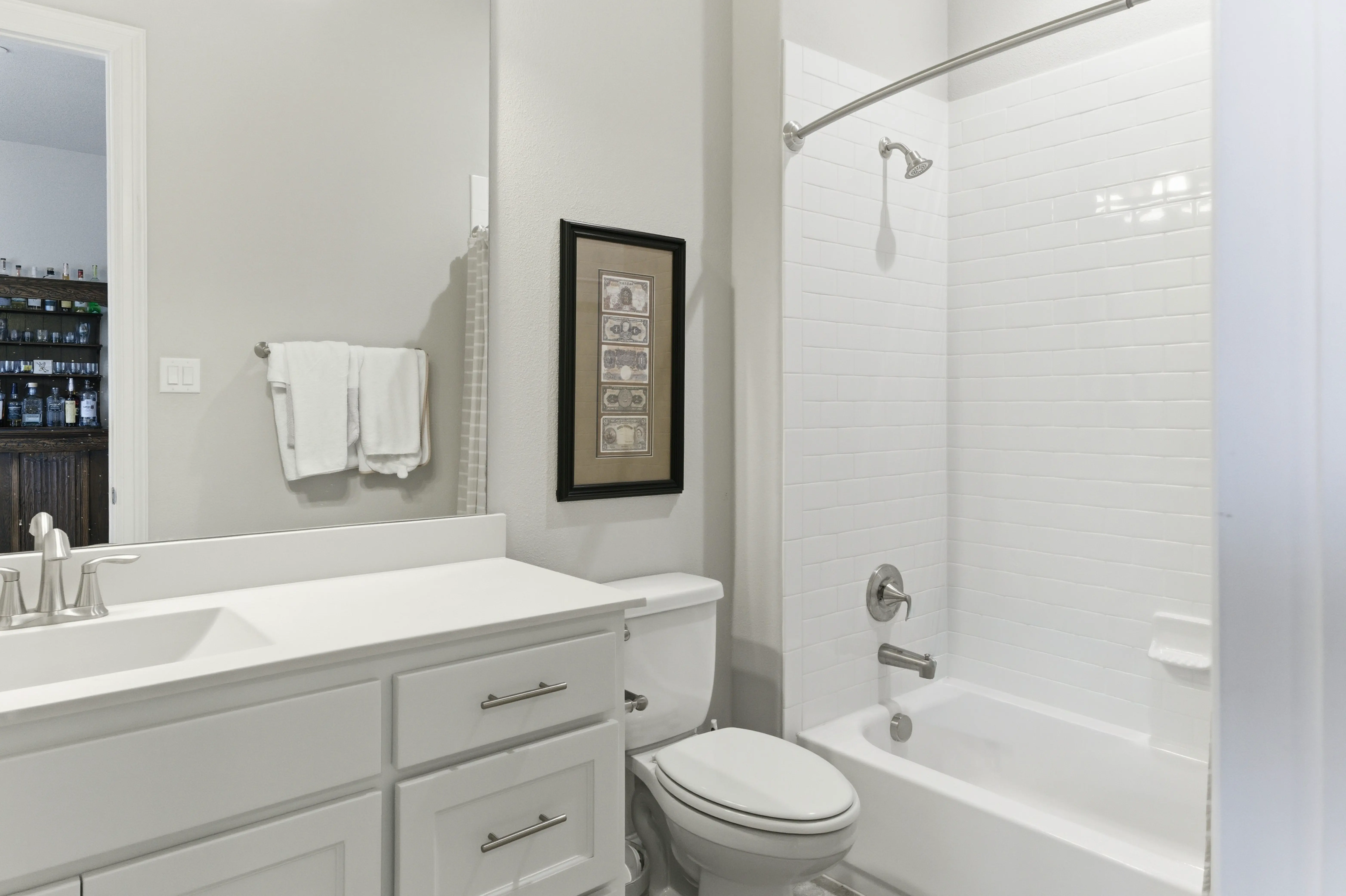 Primary bedroom with neutral tones